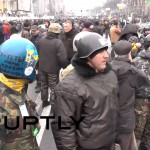 «Освободители Киева» прошли маршем с ведрами и метлами